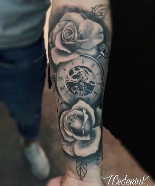 Medium Black and Grey Roses and Clock Tattoo on Men Arm by @mederinktattoo_