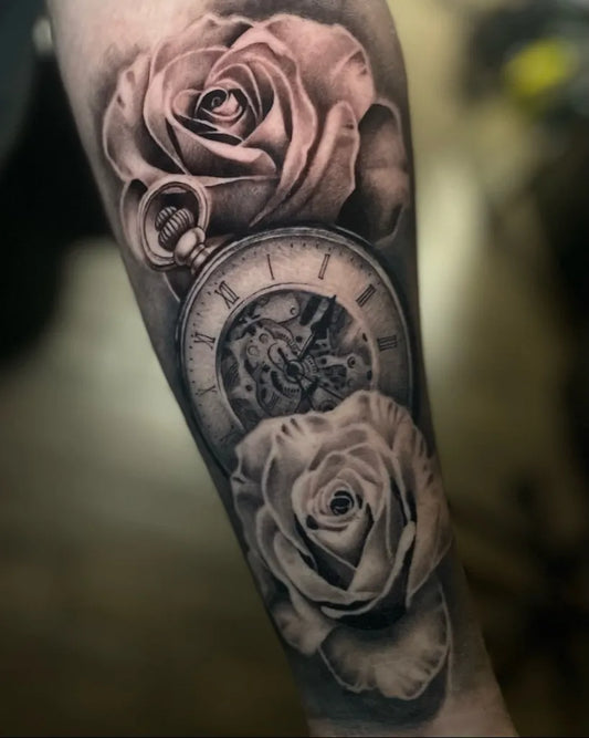 Medium Black and Grey Roses and Clock Tattoo on Men Arm by @nathanmtattoo