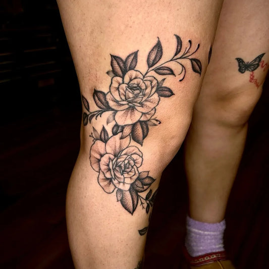 Medium Black and Grey Roses and Vines Tattoo on Women Knee by @lkt_luciano