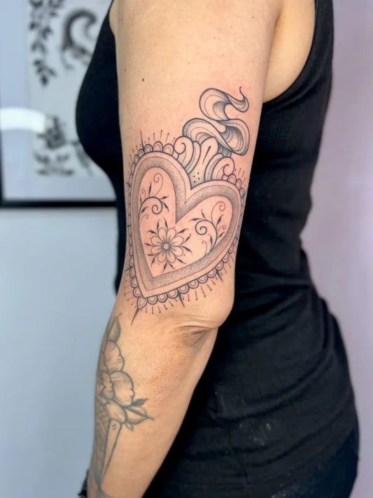Medium Black and Grey Sacred Heart Tattoo on Women Arm by @nikkitattoox
