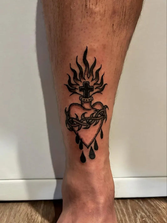 Medium Black and Grey Sacred Heart with Flames and Thorns Tattoo on Men Leg by @liljtatts