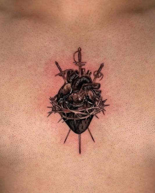 Medium Black and Grey Sacred Heart with Thorns and Swords Tattoo on Men Chest by @fa_kose