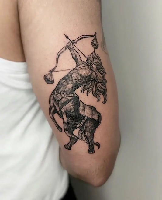 Medium Black and Grey Sagittarius Archery Tattoo on Men Arm by @vikram_pratap13