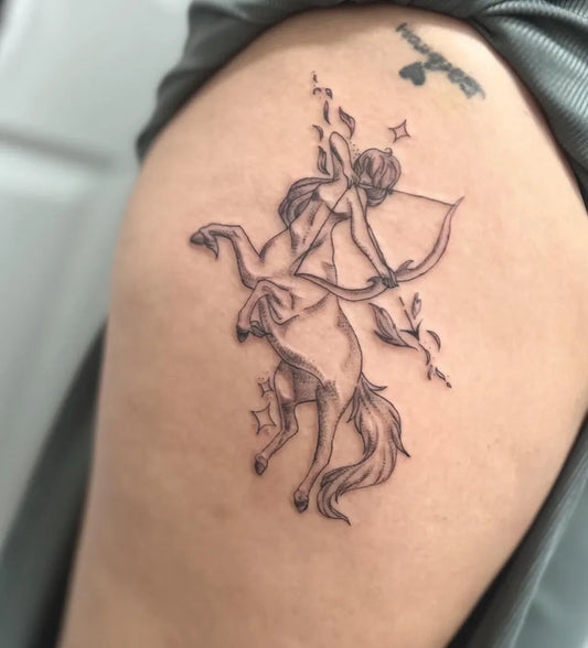 Medium Black and Grey Sagittarius Archery Tattoo on Women Shoulder by @samsamsawyer