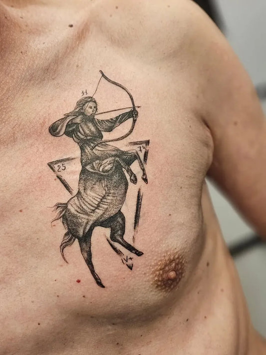Medium Black and Grey Sagittarius Centaur Tattoo on Men Chest by @ip.ink.tattoo