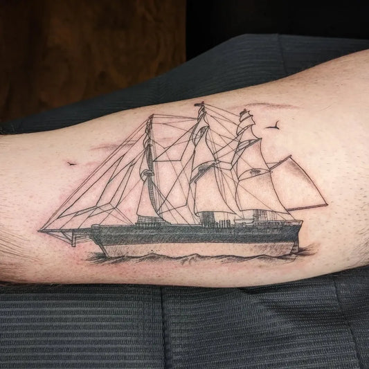 Medium Black and Grey Sailing Ship Tattoo on Men Bicep by @rmachinistart
