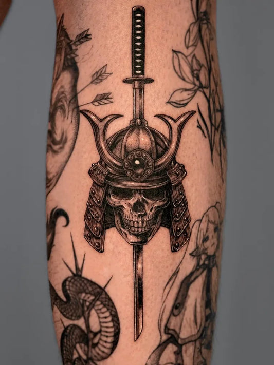 Medium Black and Grey Samurai Skull with Sword and Snake Tattoo on Men Arm by @oaastudio