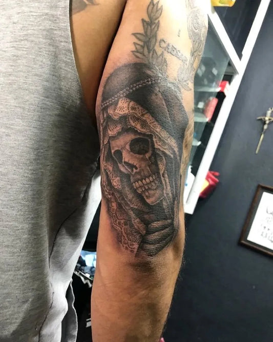 Medium Black and Grey Santa Muerte Hooded Skull Tattoo on Men Arm by @spencer_ink_cs