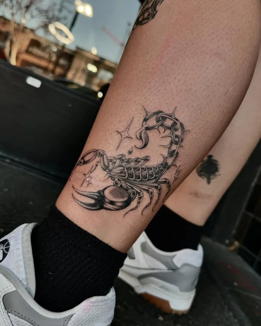 Medium Black and Grey Scorpion with Stars on Women Leg Tattoo by @laniiisworld