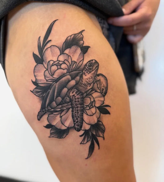Medium Black and Grey Sea Turtle and Peony Tattoo on Women Thigh by @kylebehrtattoos