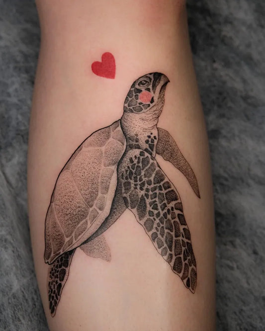 Medium Black and Grey Sea Turtle with Heart Tattoo on Women Arm by @skvlska