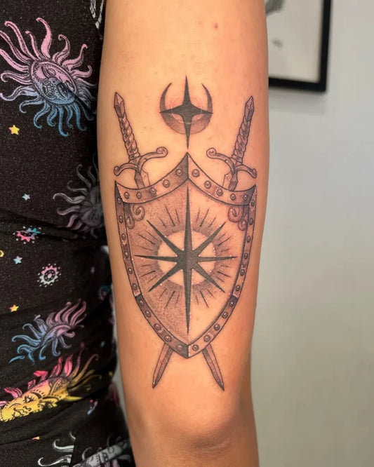 Medium Black and Grey Shield Swords on Women Arm Tattoo by @toothfairytats