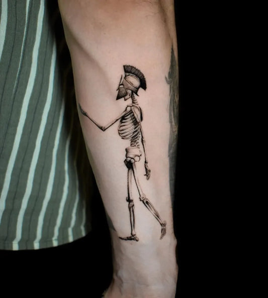 Medium Black and Grey Skeleton Warrior Tattoo on Men Arm by @micro.montagna