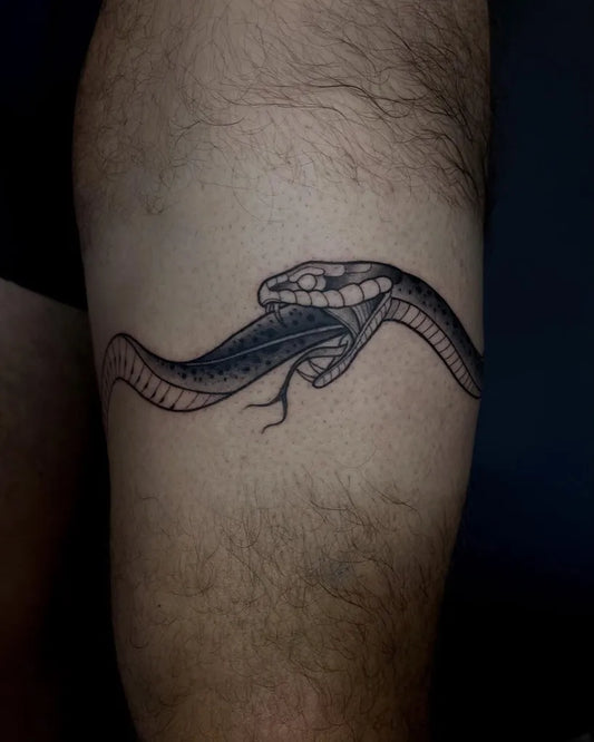 Medium Black and Grey Snake Tattoo on Men Thigh by @skipper_87_tattooing
