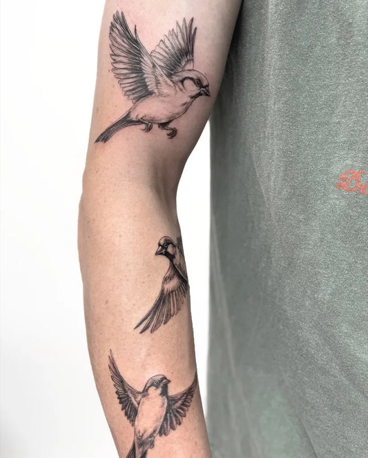 Medium Black and Grey Sparrow Tattoo on Men Arm by @zezitattoo