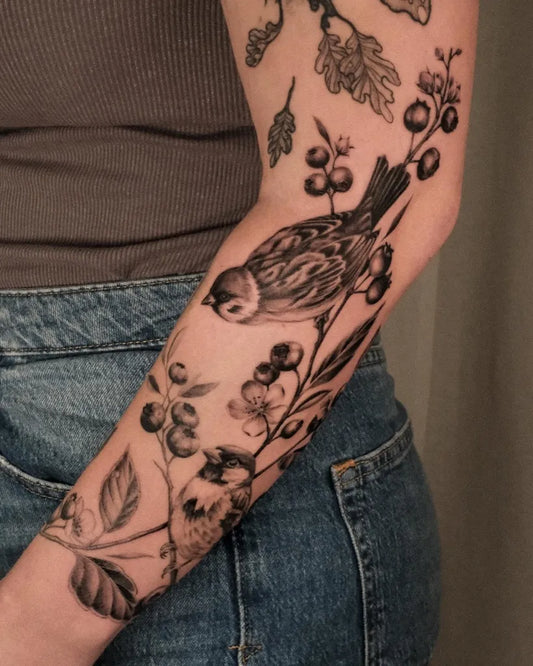 Medium Black and Grey Sparrow and Berries Tattoo on Women Arm by @toni.mazuranic