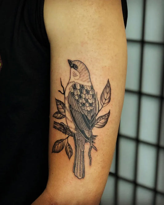 Medium Black and Grey Sparrow with Leaves Tattoo on Men Arm by @vis.badseed