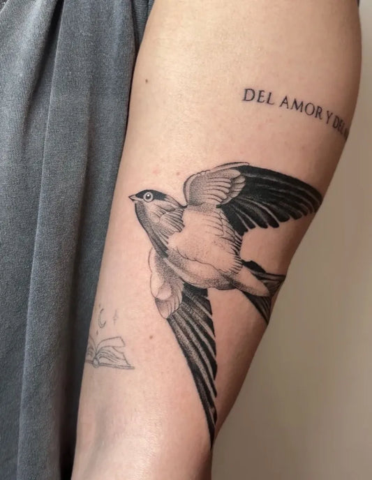 Medium Black and Grey Sparrow with Script Tattoo on Women Arm by @redvantattoo
