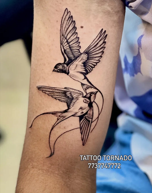 Medium Black and Grey Sparrows Tattoo on Men Arm by @tattoo_tornado_official