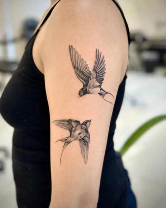 Medium Black and Grey Sparrows Tattoo on Women Arm by @baronarttattoo
