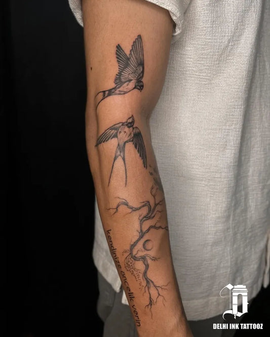Medium Black and Grey Sparrows and Branches Tattoo on Men Arm by @delhi_ink_tattooz