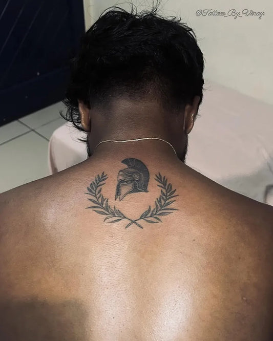 Medium Black and Grey Spartan Helmet with Laurel Wreath Tattoo on Men Back by @vinay_dut