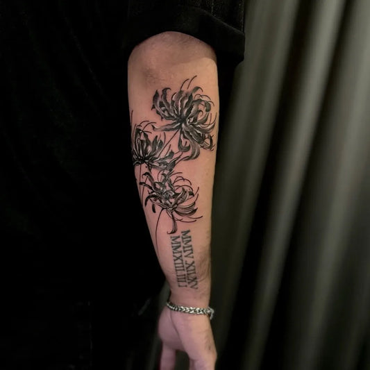 Medium Black and Grey Spider Lily black Tattoo on Men Arm by @rinktattooz