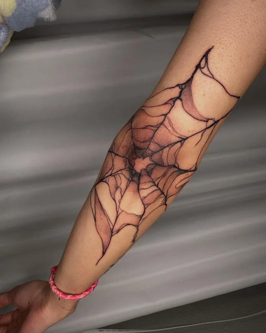 Medium Black and Grey Spider Web Tattoo on Women Elbow by @jettblackjune