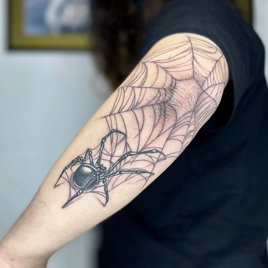 Medium Black and Grey Spider Web Tattoo on Women Elbow by @mktattooer
