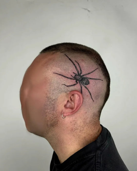 Medium Black and Grey Spider on Men Head Tattoo by @samcharltontattoo