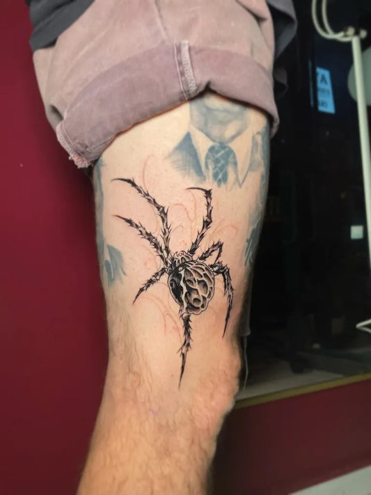 Medium Black and Grey Spider on Men Leg Tattoo by @kaanak.tattoos
