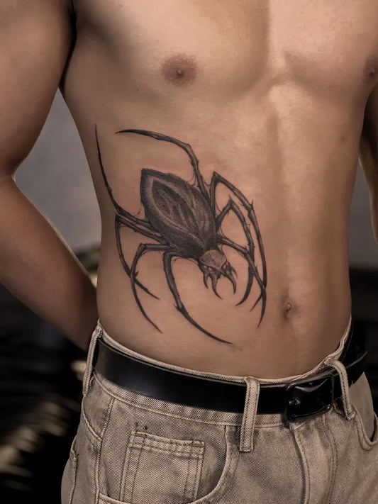 Medium Black and Grey Spider on Men Side Tattoo by @spooy.w