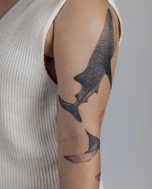 Medium Black and Grey Spotted Eagle Ray on Women Arm Tattoo by @taniavaiana