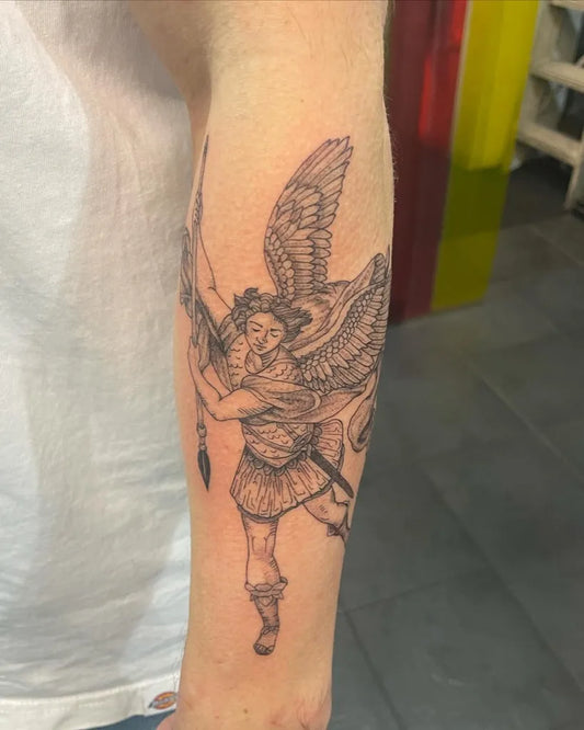 Medium Black and Grey St Michael Slaying Dragon Tattoo on Men Arm by @smileycharrtattooz