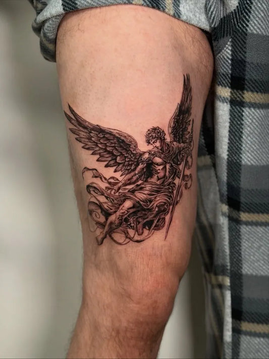 Medium Black and Grey St Michael with Wings and Sword Tattoo on Men Upper Arm by @tattoosbyarya