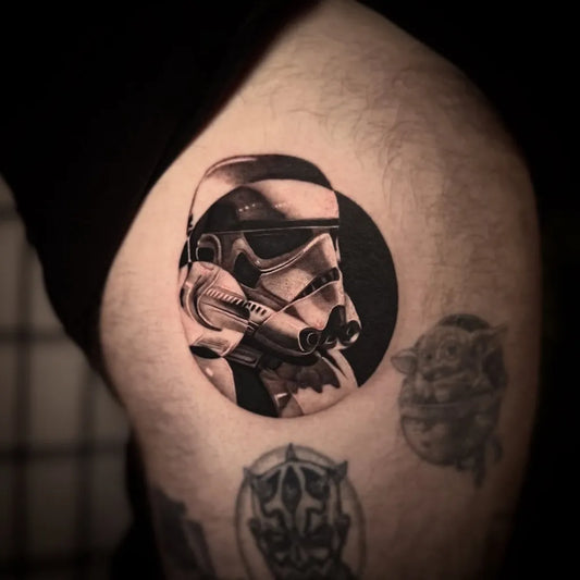 Medium Black and Grey Star Wars Stormtrooper and Yoda Tattoo on Men Thigh by @chantylou_tattoo