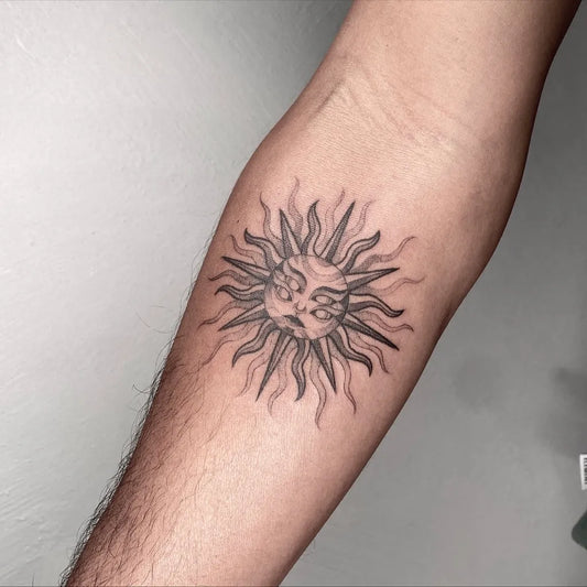Medium Black and Grey Sun Face on Men Arm Tattoo by @joandumez