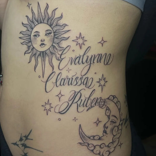 Medium Black and Grey Sun Moon Names Tattoo on Women Rib by @13londie_