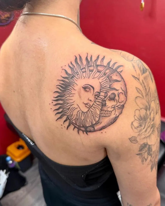Medium Black and Grey Sun Moon Skull on Women Shoulder Tattoo by @tbt_is_love_tattoo