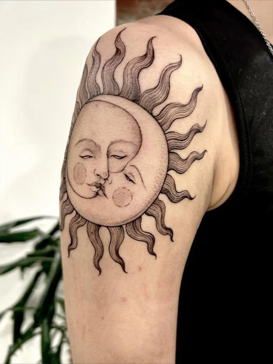 Medium Black and Grey Sun and Moon Kissing on Women Shoulder Tattoo by @larastarktattoo
