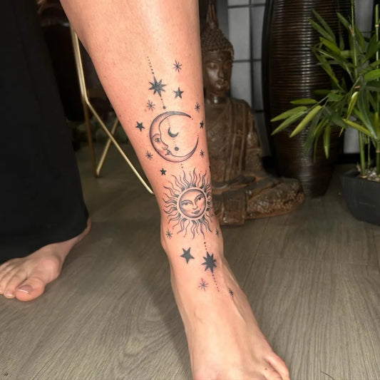 Medium Black and Grey Sun and Moon and Stars on Women Leg Tattoo by @natalietattoo