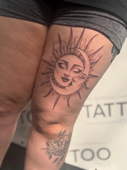 Medium Black and Grey Sun and Moon on Women Thigh Tattoo by @ameratattoo