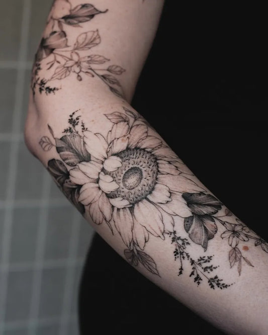 Medium Black and Grey Sunflower and Floral on Women Arm Tattoo by @stephblack