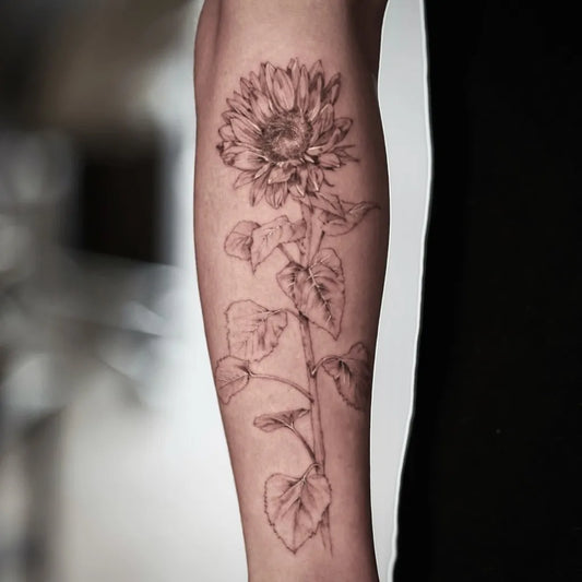 Medium Black and Grey Sunflower and Leaves on Women Arm Tattoo by @electric.eden_