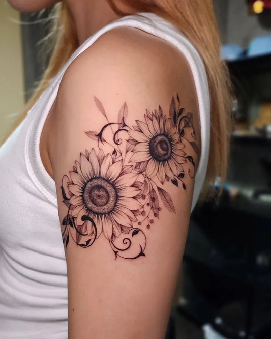 Medium Black and Grey Sunflower and Vine on Women Upper Arm Tattoo by @north_blood_miyuki