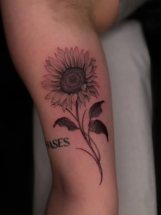 Medium Black and Grey Sunflower on Women Arm Tattoo by @yazminaferrertattoo