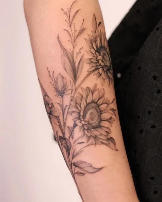Medium Black and Grey Sunflowers and Leaves Tattoo on Women Arm by @ane_tattoo