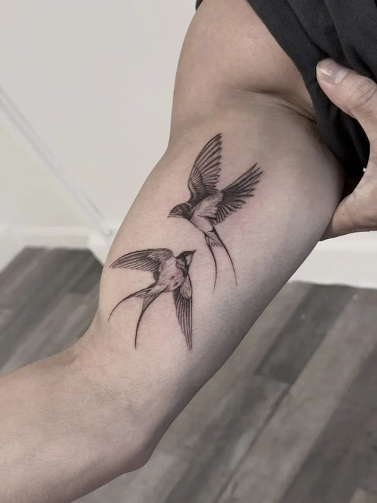 Medium Black and Grey Swallow Tattoo on Men Arm by @javitravi.ink