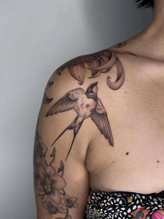 Medium Black and Grey Swallow and Lily Tattoo on Women Shoulder by @megwahh