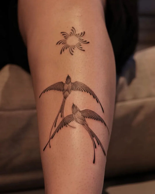 Medium Black and Grey Swallows and Sun Tattoo on Women Arm by @solyn_tattooist